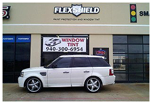 Car in Front of Shop